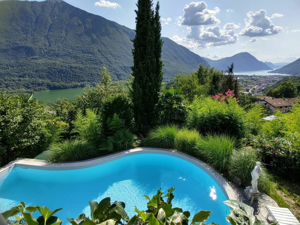 Water, Sky, Cloud, Plant, Mountain, Water Resources, Daytime, Property, Green, Natural Landscape