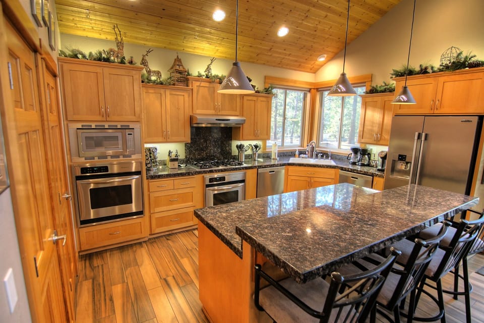 Kitchen with 2 ovens, 2 dishwashers, and gas range