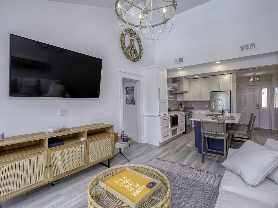 You enter the front door to a light filled open floor plan.