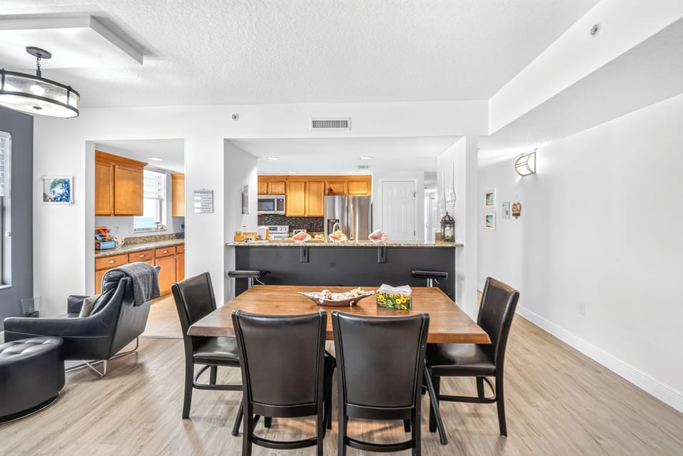 Step into your open-concept living space where the kitchen flows seamlessly into the dining and living areas—perfect for gathering, sharing meals, and making memories together.
