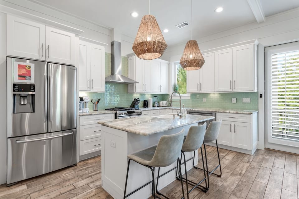 Our kitchen is a chef's delight, equipped with a six burner gas stove and all the tools and gadgets needed to create delicious meals.