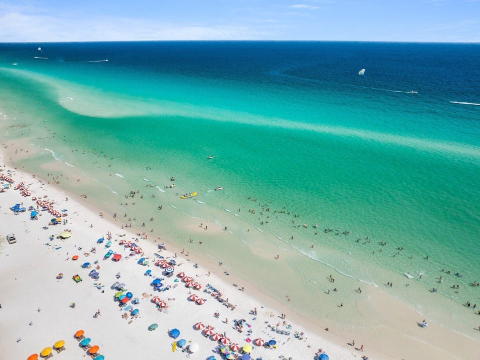 1 minute walk across Scenic Gulf Drive and your feet are in the perfect beech sand!  Pompano Jones is also right there, grab a refreshing beverage and head to the beach!