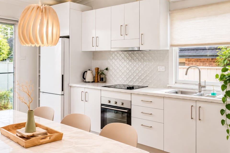 You’ll love the convenience of a washer and dryer in the second bathroom.