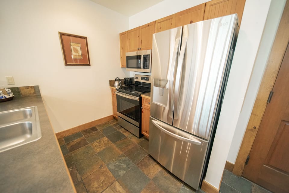 Fully equipped kitchen with stainless steel appliances
