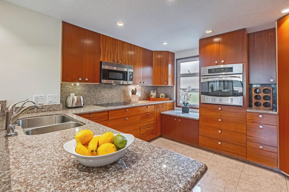 Fresh catches and family feasts come alive in this breezy, island-inspired kitchen!