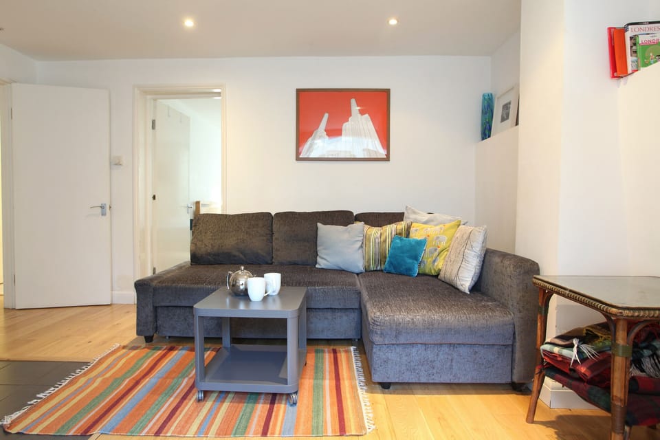 Living room with corner sofa bed