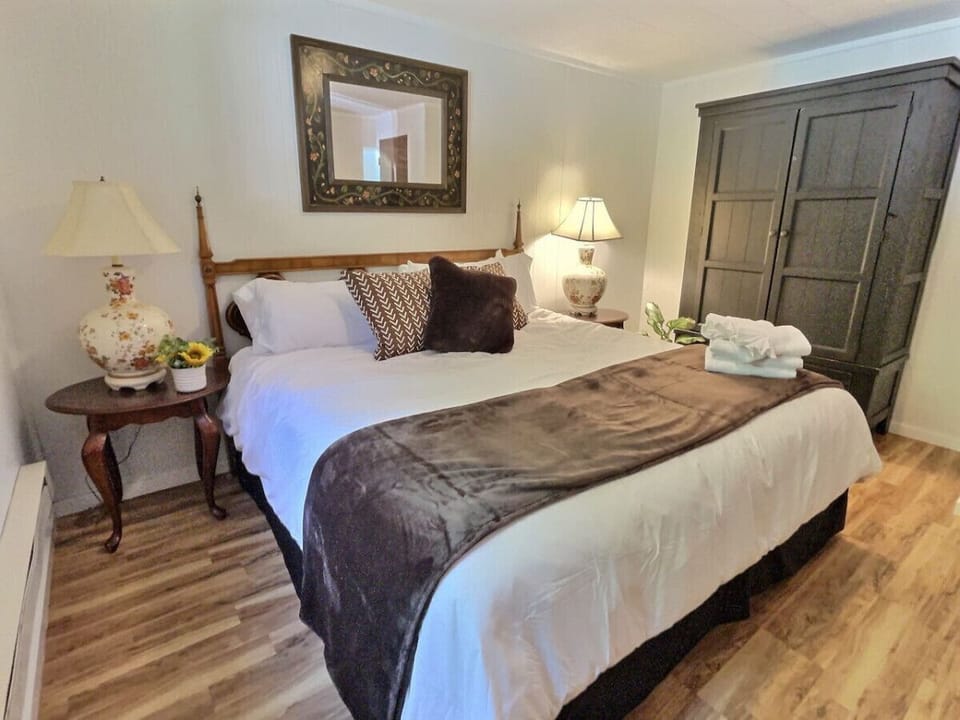 Indulge in luxury and comfort in our king bedroom.