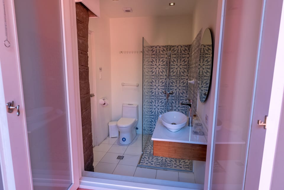 Double Room | Bathroom | Free toiletries, hair dryer (on request), towels, soap