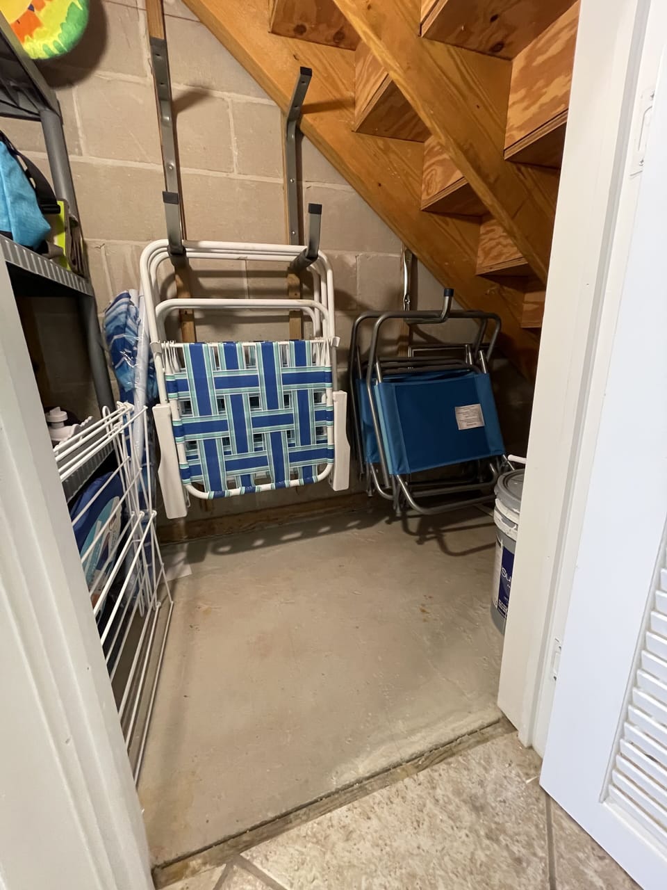 6 beach chairs, umbrella, portable soft coolers and beach toys provided.