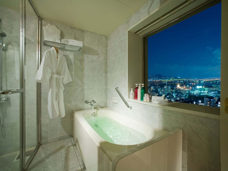 My Melody Room (No Smoking, No Shoes Allowed) | Bathroom | Combined shower/tub, free toiletries, hair dryer, slippers