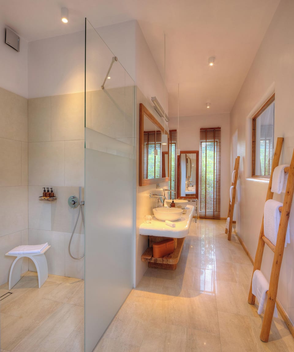 Villa, 1 Bedroom, Private Pool, Beach View | Bathroom | Designer toiletries, hair dryer, children's robes, slippers