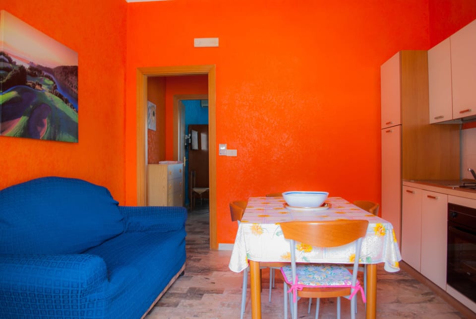 Family Studio, 1 Bedroom, Ground Floor | Minibar, in-room safe, individually decorated, desk