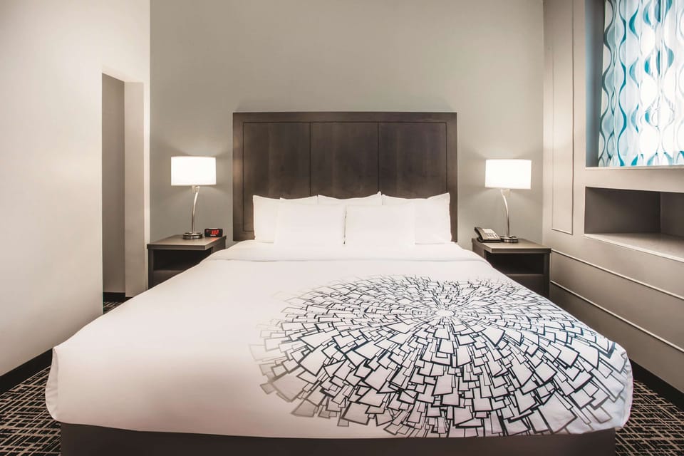 Pillowtop beds, desk, laptop workspace, blackout drapes
