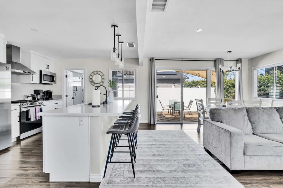 Open-concept living area with seamless flow from kitchen to living room.