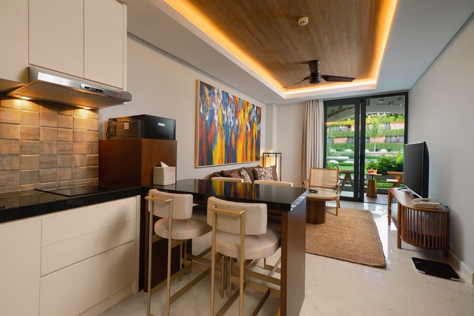 Suite, 2 Bedrooms, Garden Area | Living area | 43-inch flat-screen TV with cable channels, TV