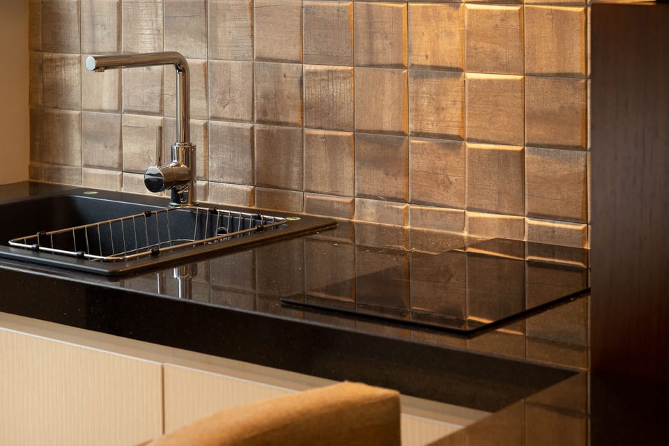 Suite, 2 Bedrooms, Garden Area | Private kitchen | Fridge, microwave, coffee/tea maker, electric kettle