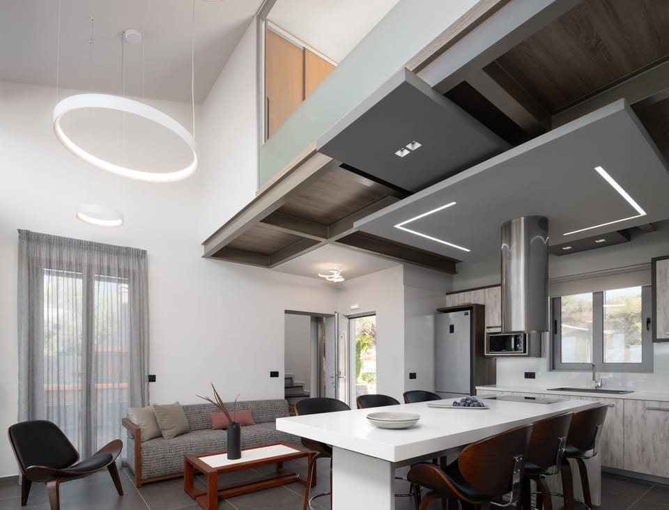 The open plan kitchen-dining area.