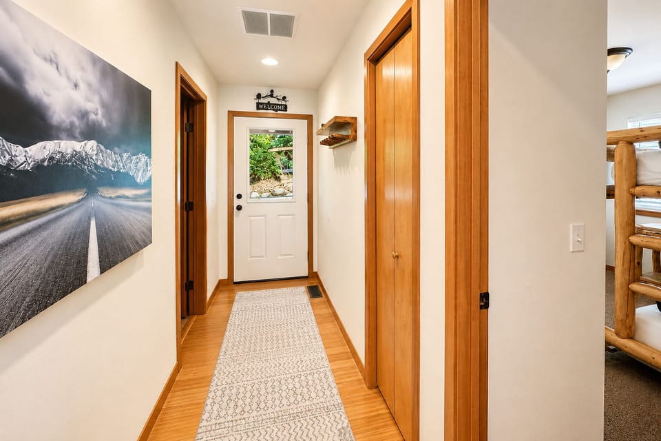 Hall to main floor bathroom and out to the hot tub