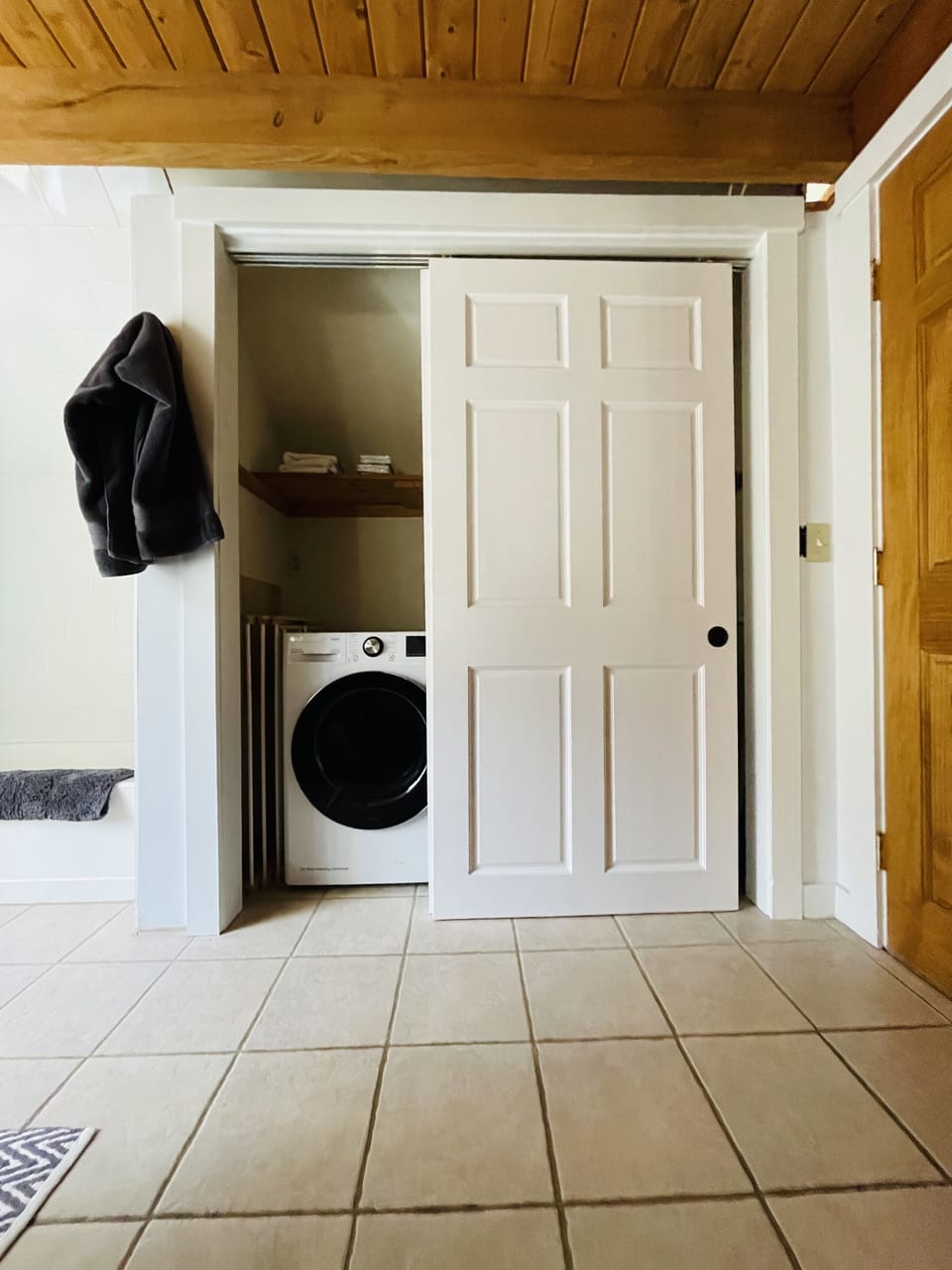 Dryer. There is also a clothes drying rack.