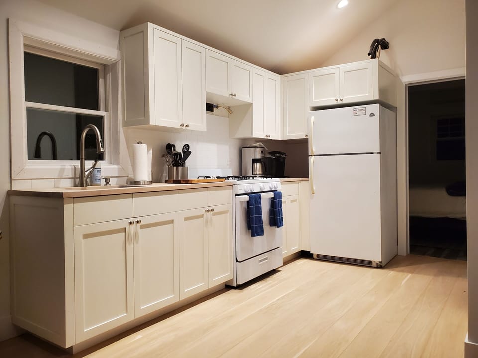 Custom kitchen fully stocked 
