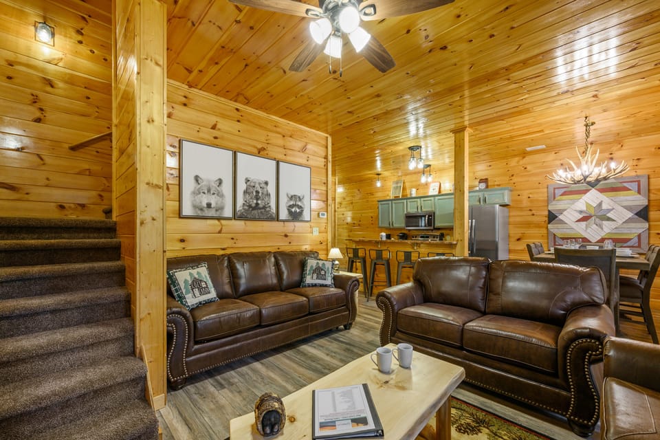 Amazing artwork surrounds you! Queen sleeper sofa in the main living room.
