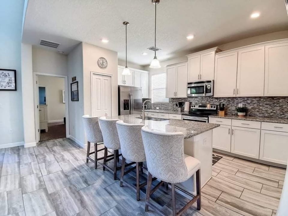 You are going to love preparing any meal in our large kitchen with island seating.