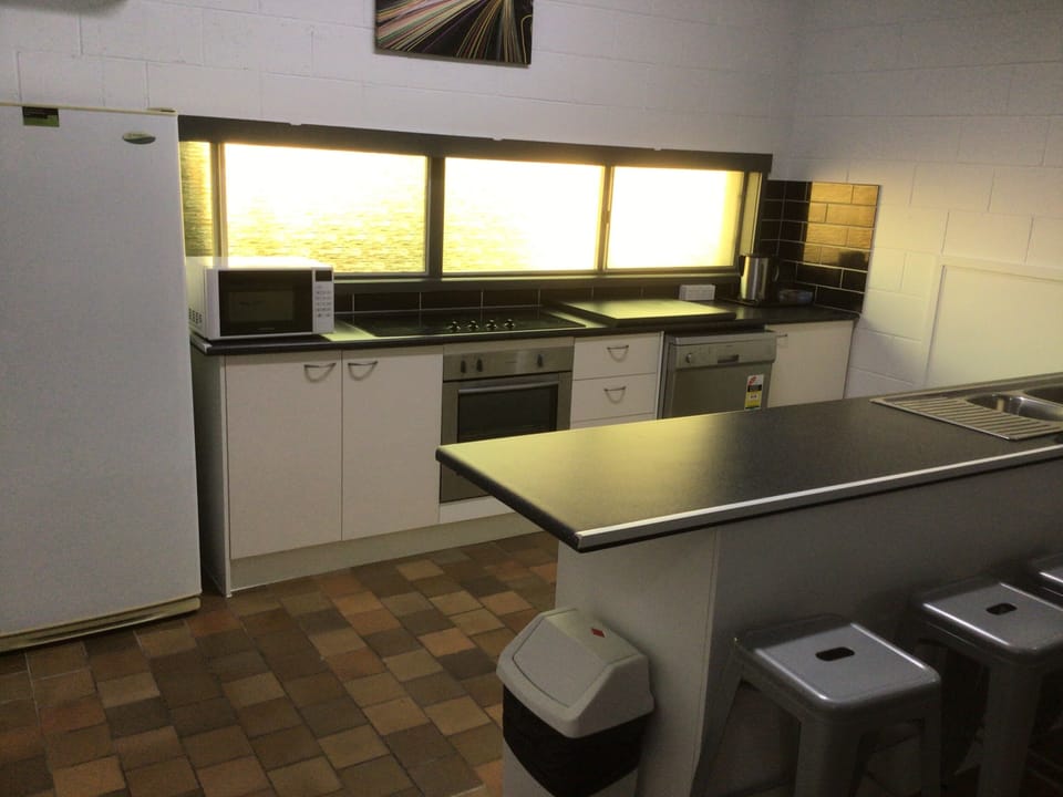Family Apartment, Pool View, Poolside | Private kitchen | Microwave, electric kettle, freezer