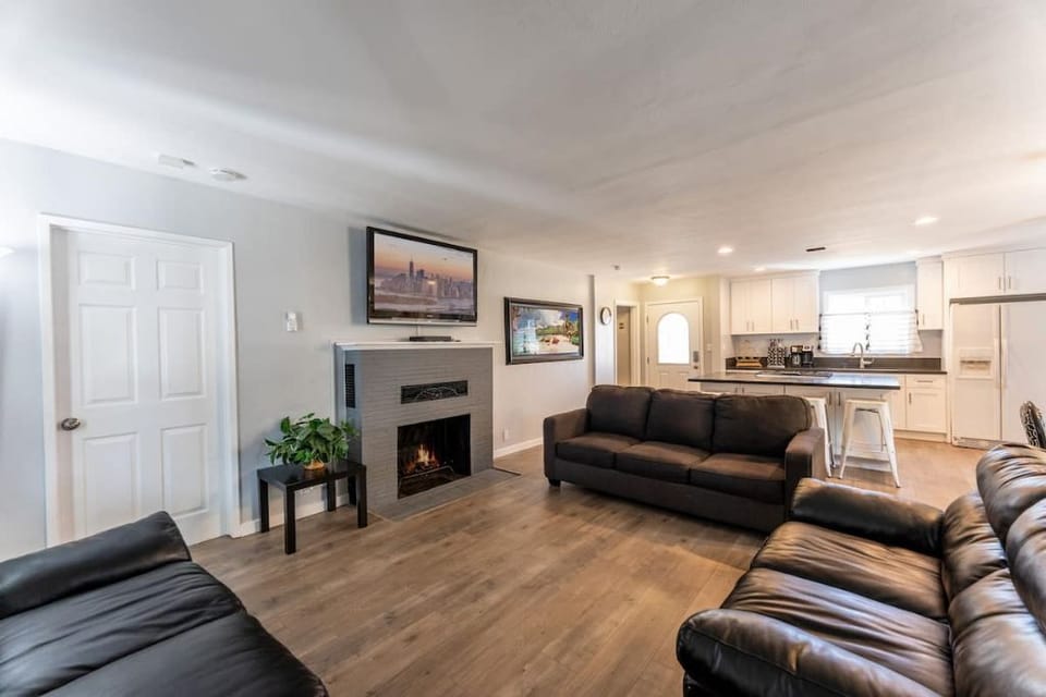 Living room with TV and sofa couch. Open concept.