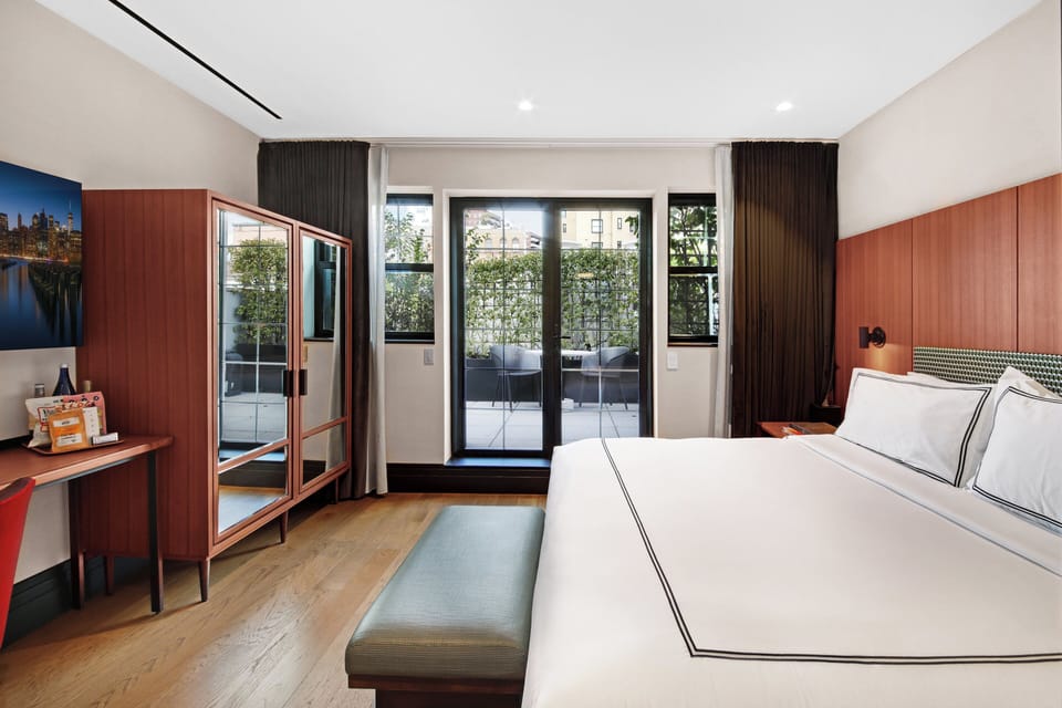 Premium bedding, down comforters, Tempur-Pedic beds, minibar