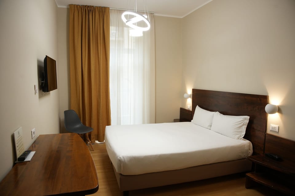 Double or Twin Room | Down comforters, minibar, desk, laptop workspace
