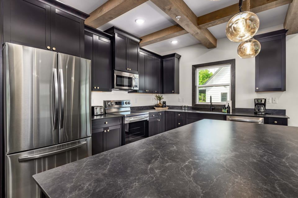 Full-size appliances and fully stocked kitchen