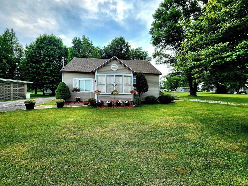 Road view showing our 2 long driveways for ease of boat and trailer parking.