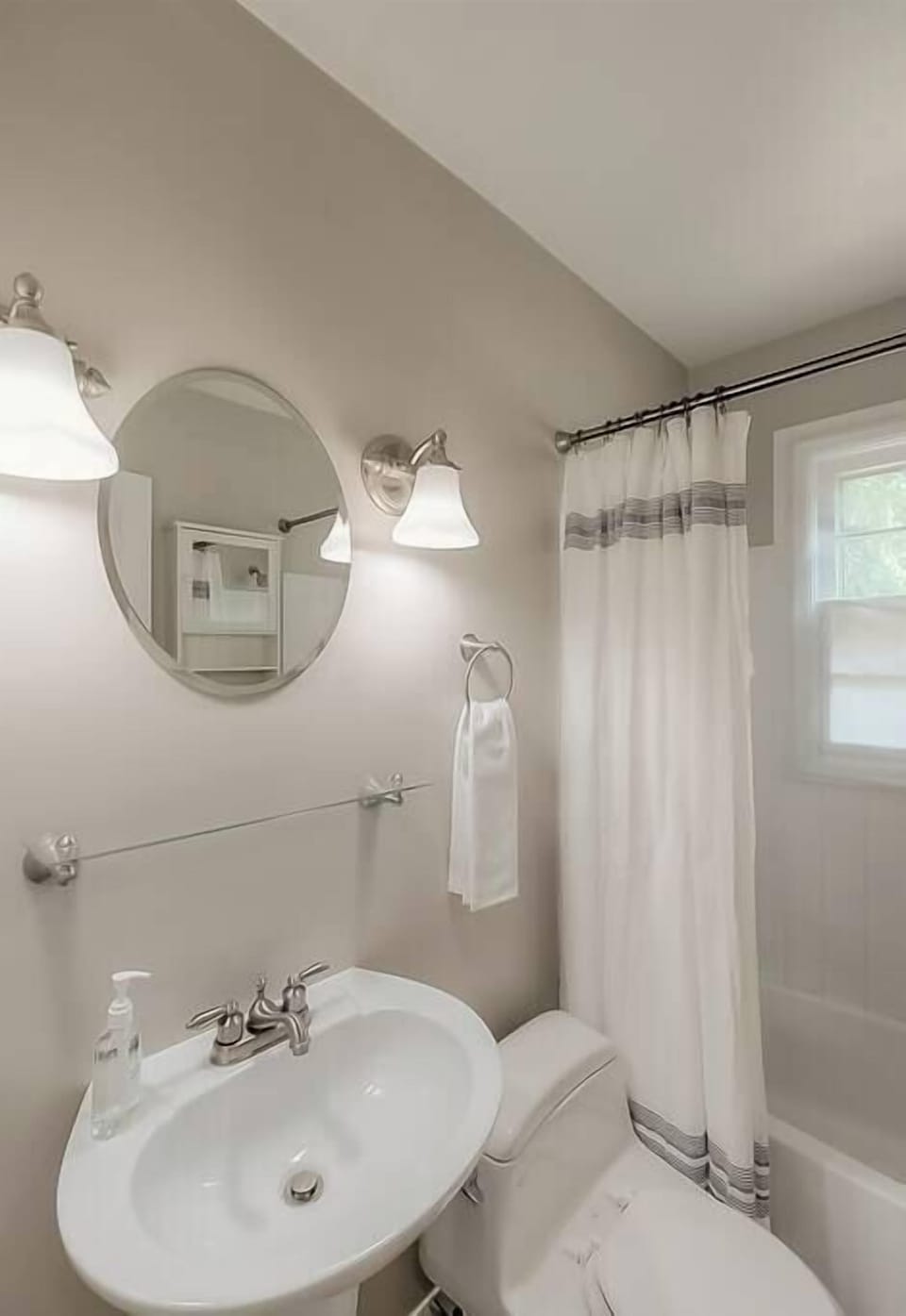 Clean up in style with our first-floor bathroom, complete with a shower and tub combo for the ultimate relaxation experience!