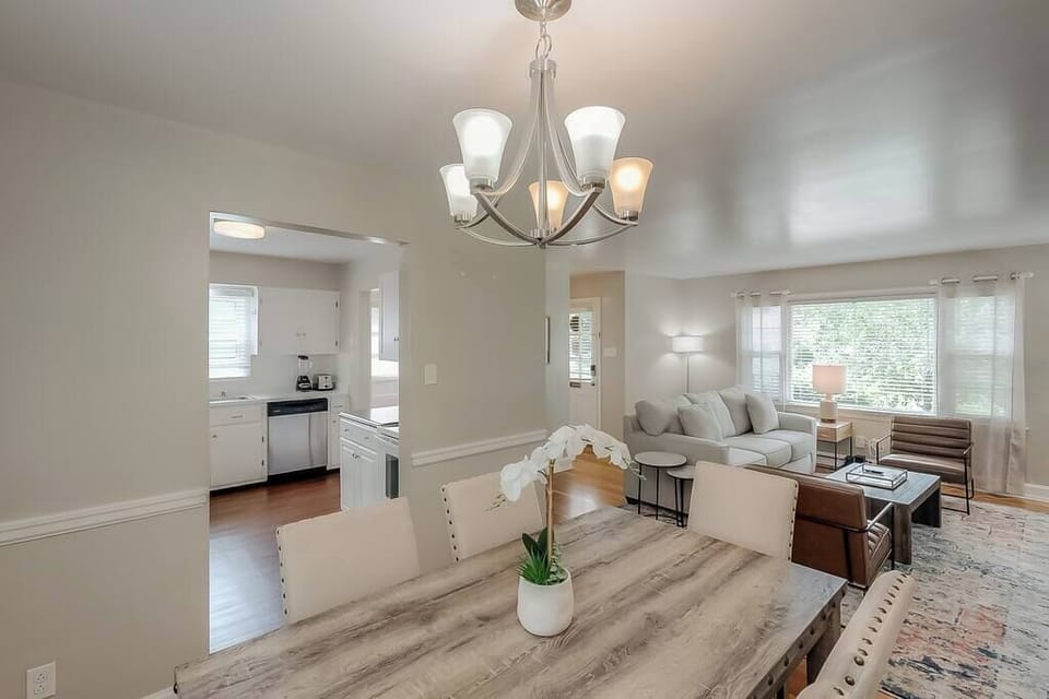 Entertain in style with our open concept dining room, seating up to 6 and seamlessly flowing into the living area for a spacious and social atmosphere.