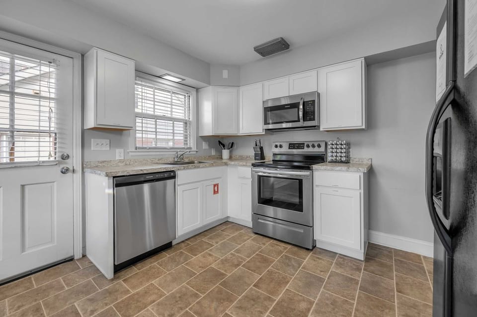 Equipped kitchen stocked with everything you need for cooking, dining, and entertaining with ease.