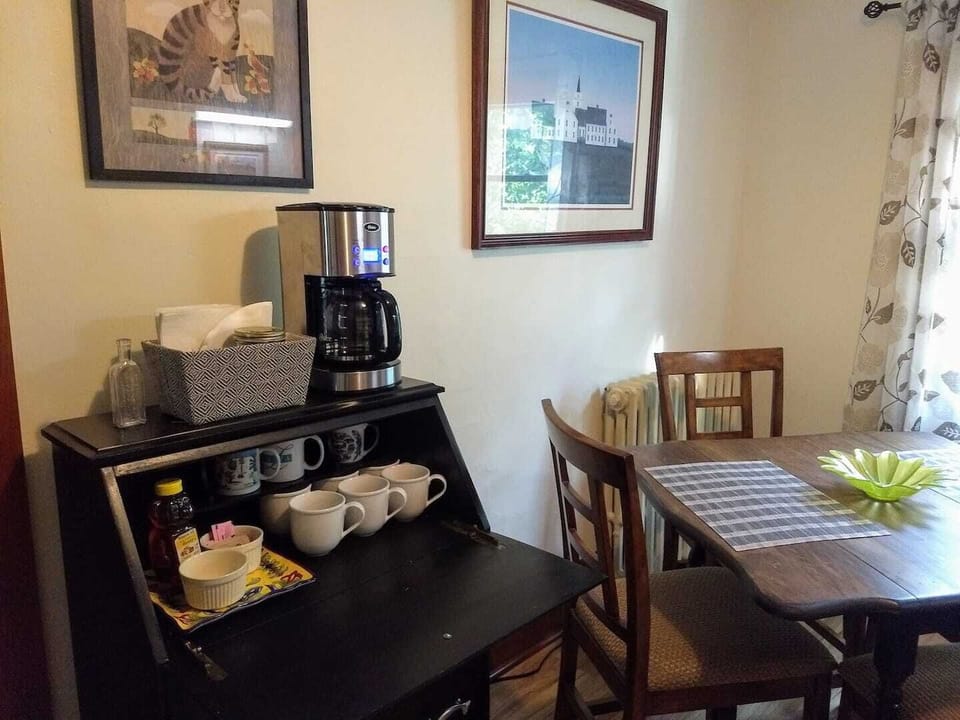 Breakfast bar with coffee, tea, hot chocolate, sweetener & creamer.