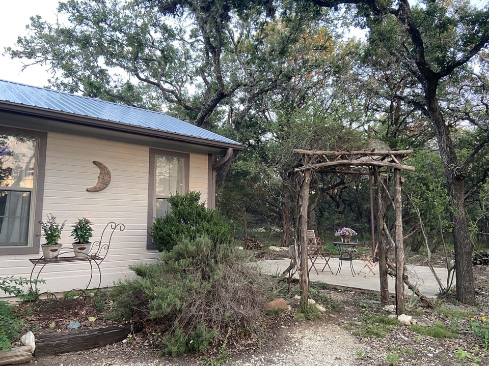 Small basketball court, also used as a patio. 