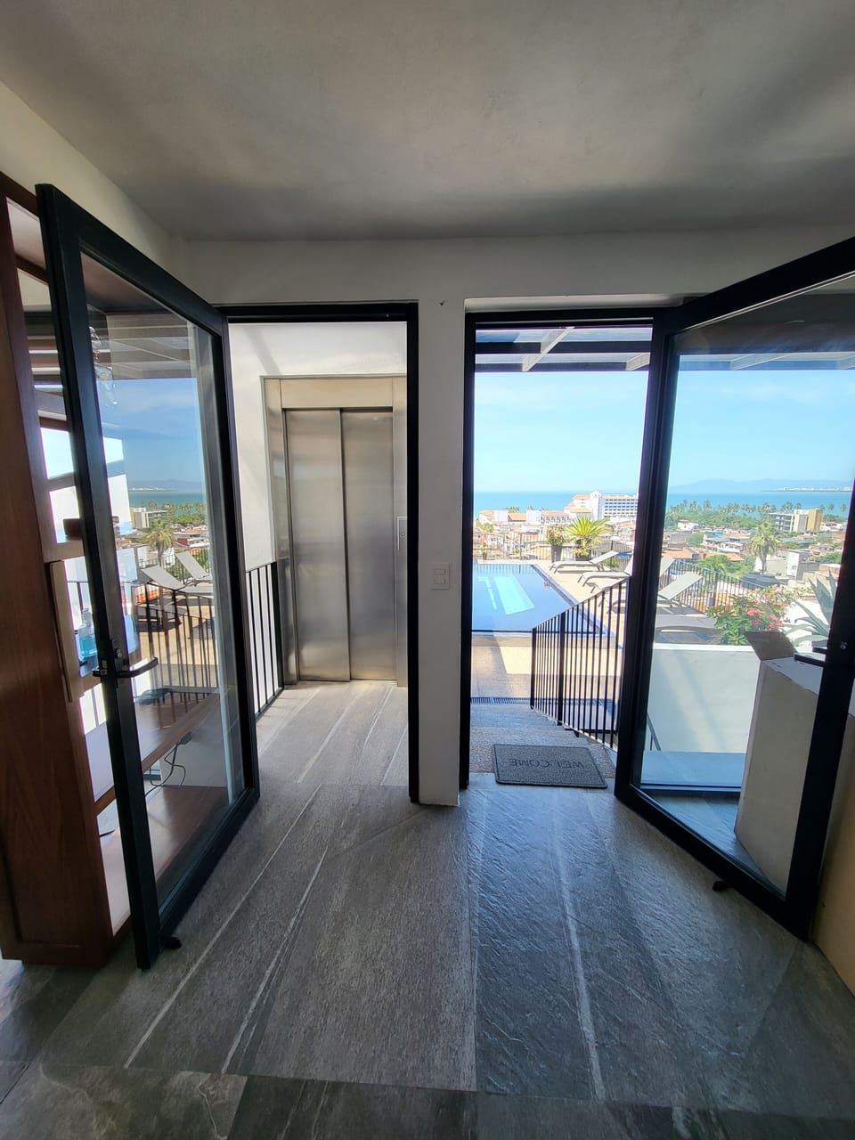 Entrances from stairs and elevator.