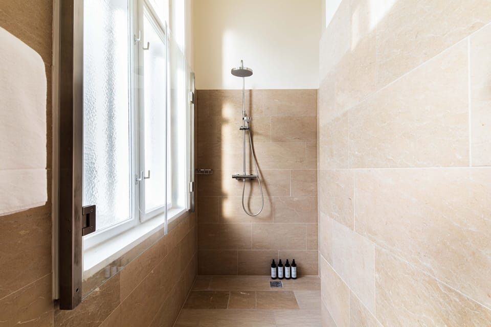 City Double Room | Bathroom | Hair dryer, slippers, towels, soap