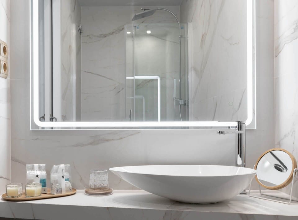 Standard Double Room, 1 Queen Bed, Balcony, City View | Bathroom | Shower, hair dryer, towels, soap