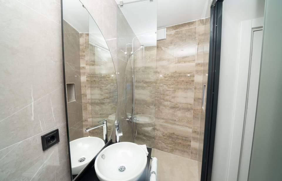 Deluxe Room, 1 Queen Bed, Terrace | Minibar, in-room safe, individually decorated, desk