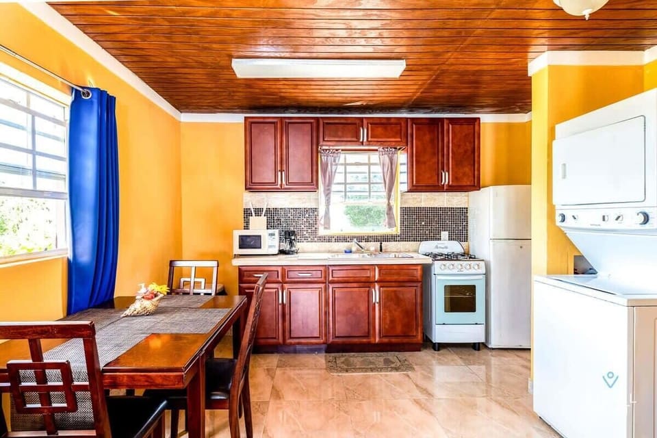 A fully-equipped kitchen for preparing meals at home.