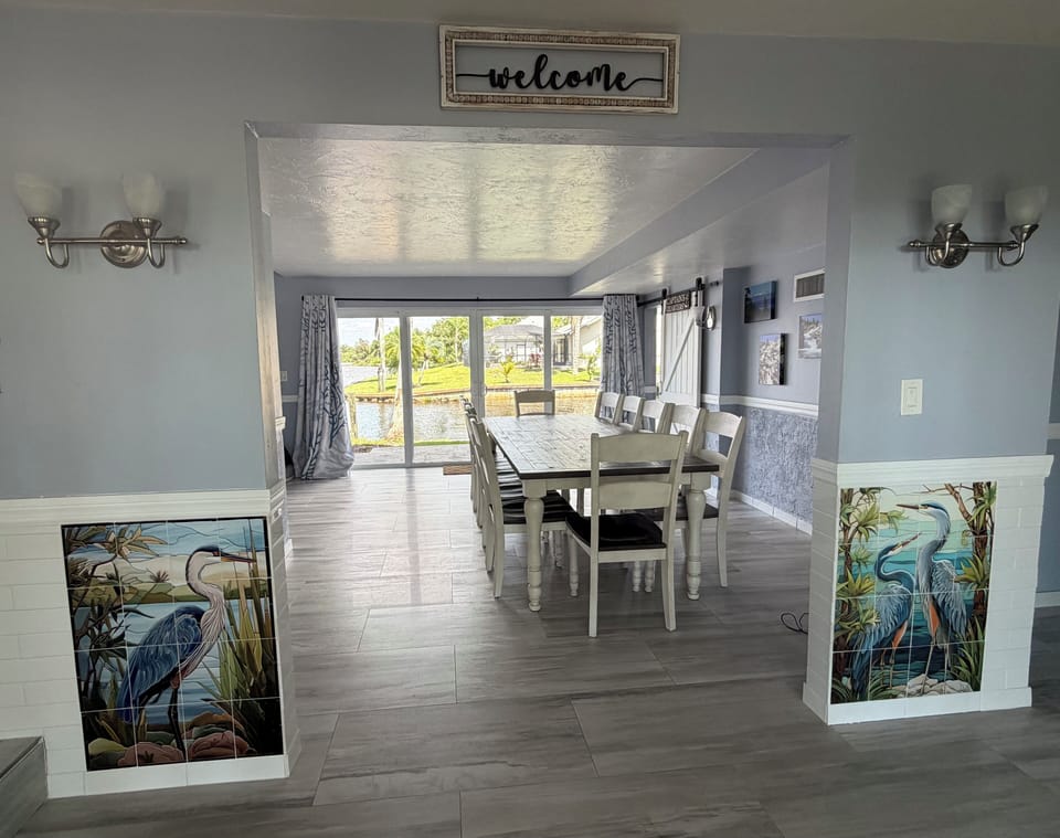 Dining room just inside the entry doors. 
