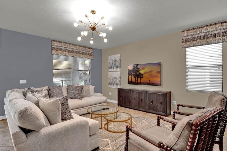 Modern living room design with a smart tv featuring all your favorite apps and cable tv.