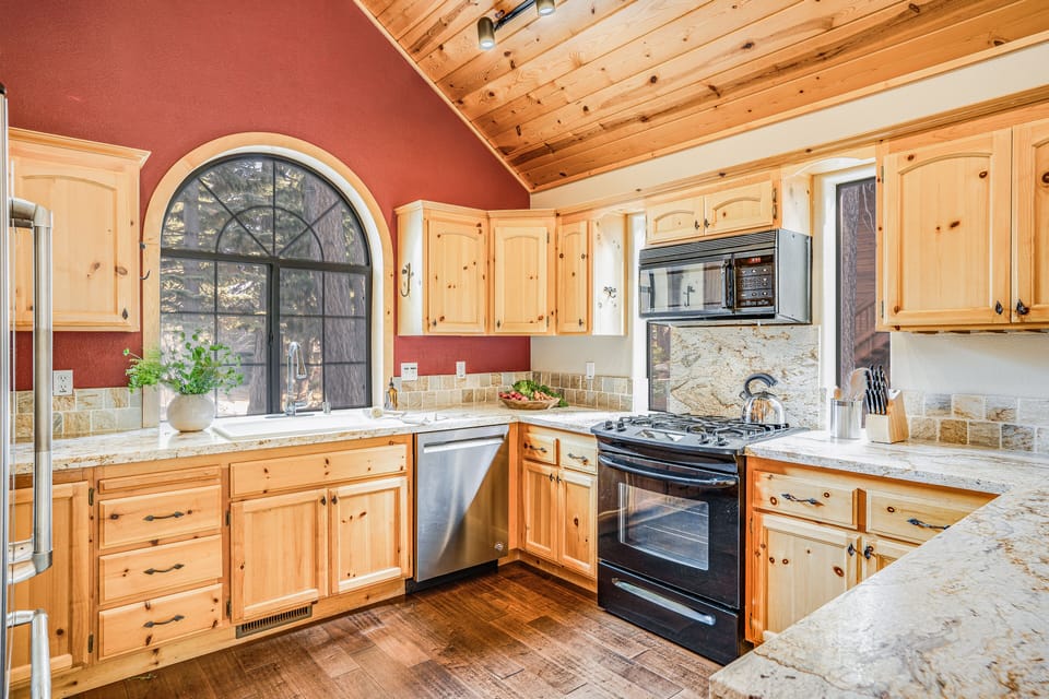 Spacious kitchen to cook your favorite meal! A lovely dinner awaits!