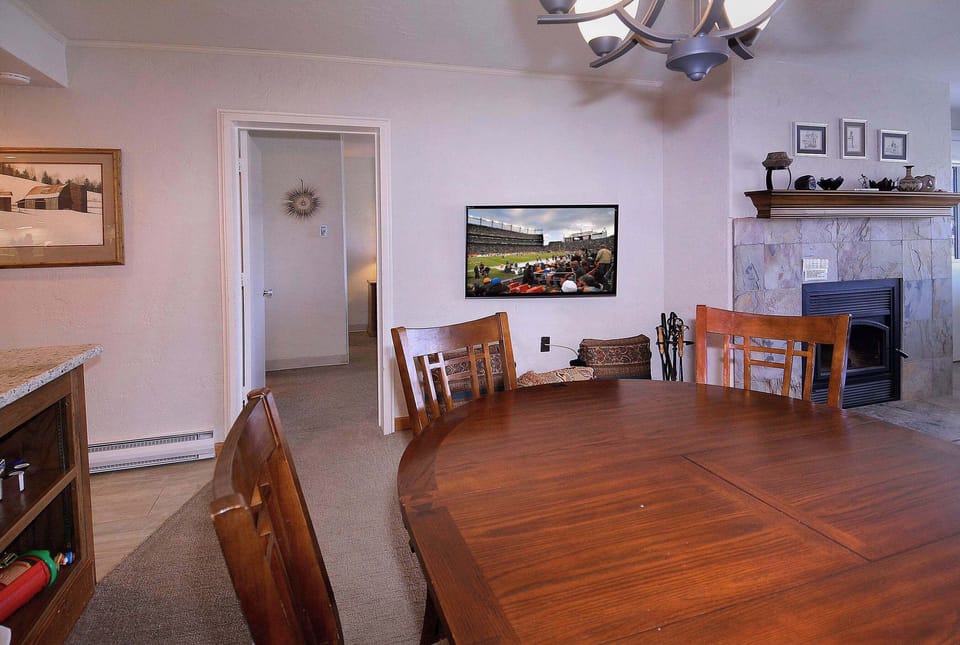 Dining table, door to primary bedroom