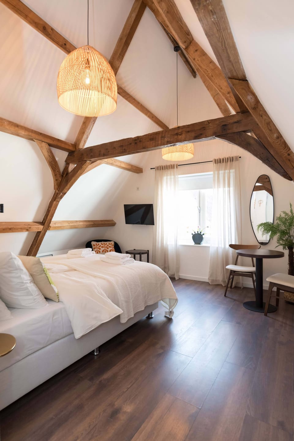 Cozy double bed in romantic attic room