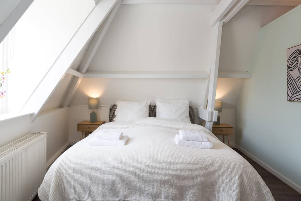 Comfy double bed in the first bedroom 