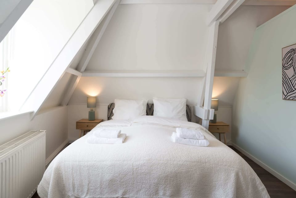 Comfy double bed in the first bedroom 