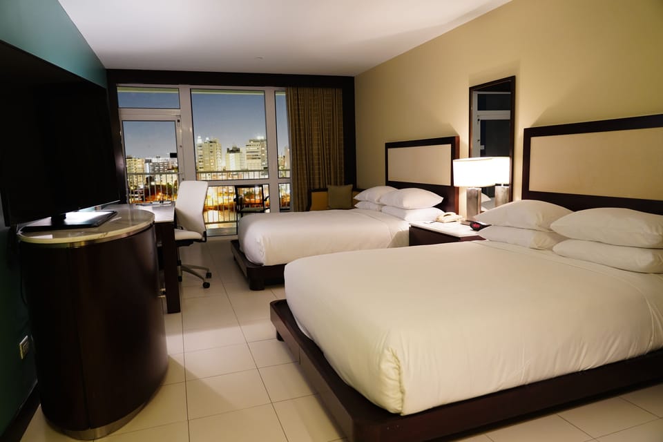 Room, 2 Queen Beds, Balcony, Bay View | Premium bedding, down comforters, in-room safe, iron/ironing board
